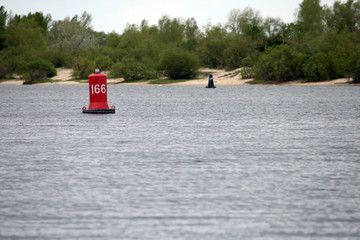 red buoy on the waves in the river