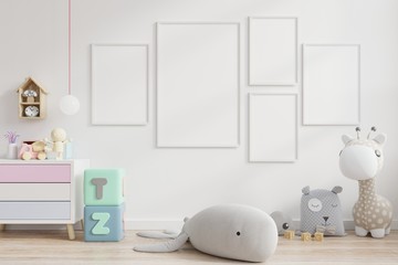 Mock up posters in child room interior.