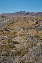 Truck passing on the way to Miscanti Lagoon. Flamingos National Reserve Conaf. San Pedro de Atacama, Antofagasta - Chile. Desert. Andes Range & Route 23.