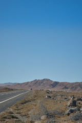 Truck passing on the way to Miscanti Lagoon. Flamingos National Reserve Conaf. San Pedro de Atacama, Antofagasta - Chile. Desert. Andes Range & Route 23.