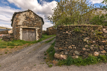 Traditional slate buildings in El Muyo black village of the Riaza district in the province of Segovia (Spain)
