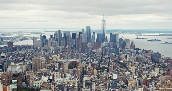 Panorama of downtown Manhattan with famous financial district and World Trade Center, Hudson River and East River,  filmed from vantage point.