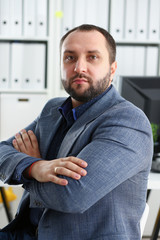 Fototapeta premium portrait of young handsome promising businessman in office