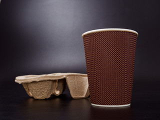 eco-friendly packaging for fast food on a dark background