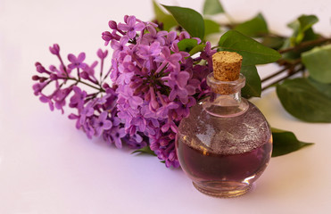 Obraz na płótnie Canvas Fragrant lilac flower perfume, cologne