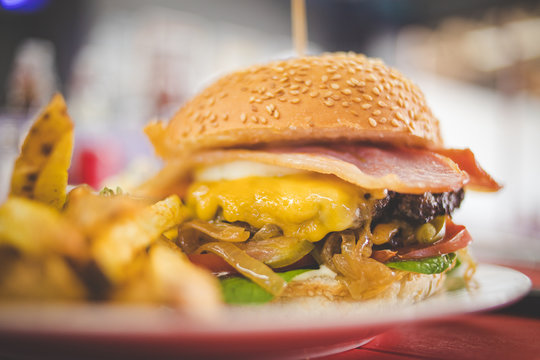 Close up image of a gourmet hamburger in a gourmet restaurant