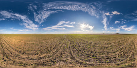 full seamless spherical hdri panorama 360 degrees angle view among fields in spring day with...