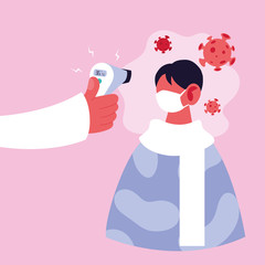 doctor measures the temperature of a man in a medical mask, coronavirus prevention