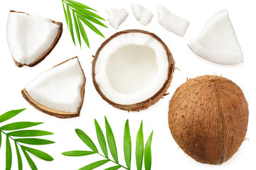 Fototapeta na wymiar half coconut with green leaves isolated on white background top view