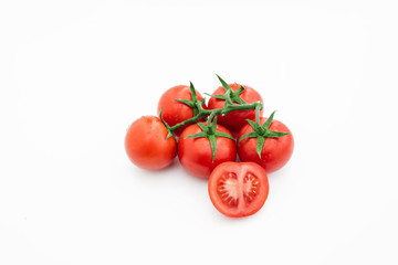 Closeup of tomato white on white background.  Healthy vegan food. Tomato top view. White background. Studio shot. Cherry isolated. Healthy vegetarian food. Cherry set.