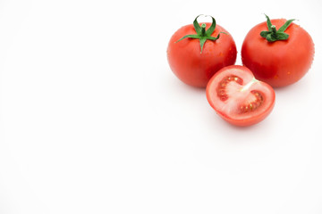Closeup of tomato white on white background.  Healthy vegan food. Tomato top view. White background. Studio shot. Cherry isolated. Healthy vegetarian food. Cherry set.