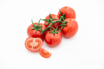 Closeup of tomato white on white background.  Healthy vegan food. Tomato top view. White background. Studio shot. Cherry isolated. Healthy vegetarian food. Cherry set.