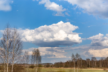 Huge clouds in the blue sky.