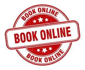 book online stamp. book online round grunge sign. label