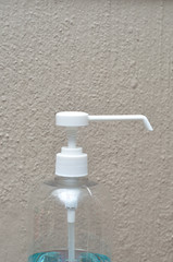Fototapeta na wymiar A white nozzle on a plastic bottle