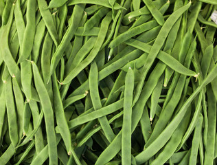 green romano beans on the counter in the market