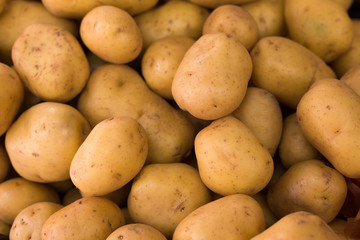 potatoes on counter in market