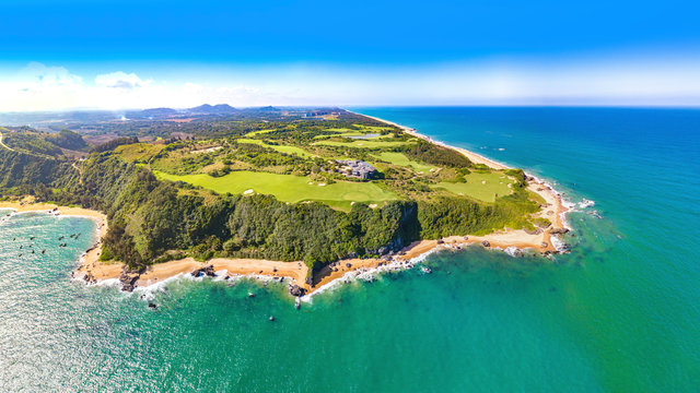 Shanqin Bay, Wanning County, Hainan Island, a Seaside Golf Course Built on a Rolling Land that Overlooks the South China Sea. Aerial View.