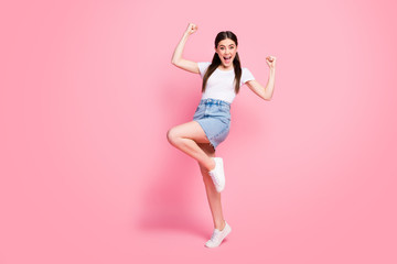 Fototapeta na wymiar Full length body size view of her she nice-looking attractive lovely charming cheerful cheery overjoyed lucky girl rejoicing having fun attainment isolated over pink pastel color background