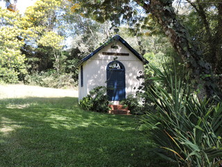 Fototapeta na wymiar Small chapel by the road