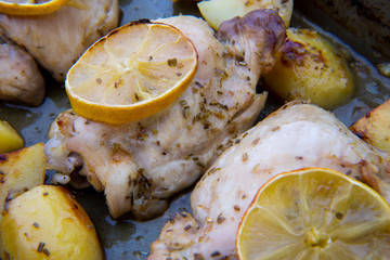 Fototapeta na wymiar Oven baked greek lemon chicken and potatoes