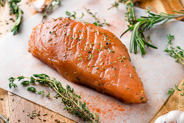 raw fillet with spices and rosemary for grilling