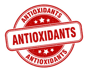 antioxidants stamp. antioxidants round grunge sign. label