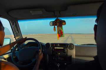 Naklejka premium Driving over salt flats in Danakil desert, Ethiopia