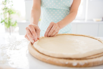 Cropped close up photo of concentrated girl want prepare margarita pizza make crust dough chopping...