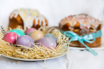 Pascal cake and colored eggs for the traditional celebration of the Christian holiday of Easter