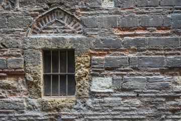 old window in stone wall