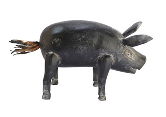 wooden black toy pig statuette decor isolated on white background. Details of modern boho bohemian scandinavian and minimal style eco design interior