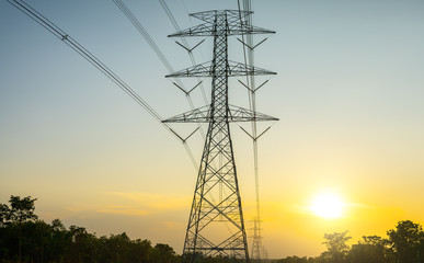 High voltage pole with sunset sky