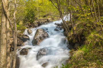 Waterfall in the Riu de la Bor in L Aldosa de Canillo in Andorra in spring.