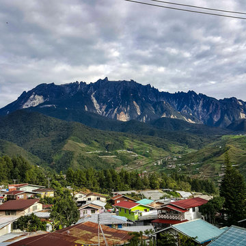 Houses Against Mt Kinabalu