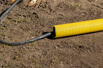Power electric Cable installation in the double -wall cable conduits. Cable trench installation