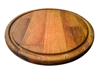 Round wooden kitchen board isolated on white.