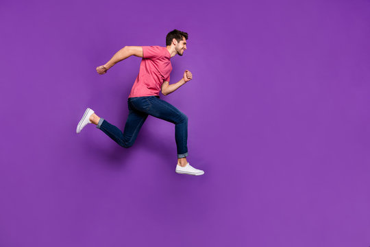 Full body profile side photo of cheerful energetic crazy guy jump run after incredible season spring discount wear lifestyle outfit sneakers isolated over shine color background