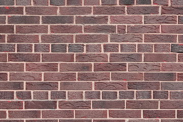 Brown background of beautiful unusual building brick