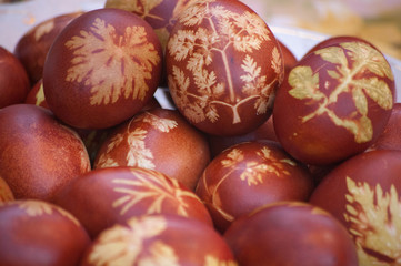Easter eggs with leaf patterns on the table