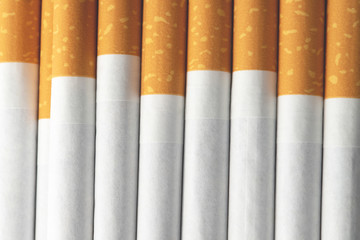 image pattern of several commercially made pile cigarette. or Non smoking campaign concept. texture tobacco.