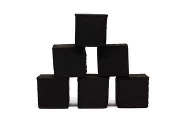Coconut black square charcoal for hookah isolated on white background