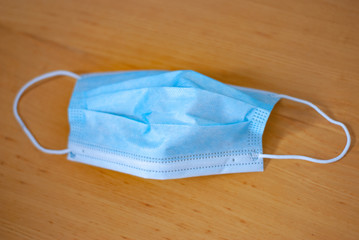 protective mask on a wooden background
