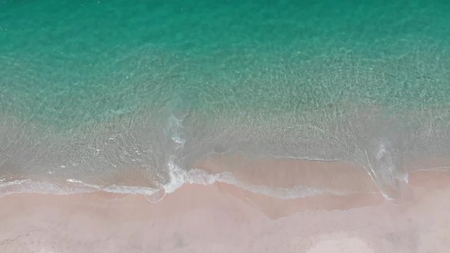Aerial View of waves crashing on the shore of Conchal Beach, Guanacaste, Costa Rica