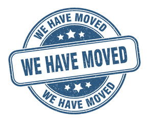 Fototapeta premium we have moved stamp. we have moved round grunge sign. label
