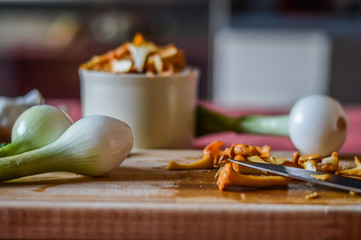 chopped chaterelle mushrooms and vegetables close up