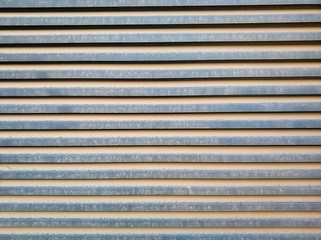 Old rusty metal ventilation grille. Grunge background.