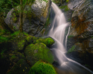 Waterfall jumps between granite walls