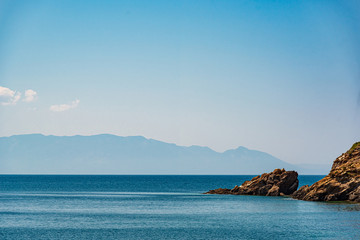 Beautiful seascape with mountains on the horizon