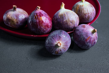 Close-up fresh figs on dark background